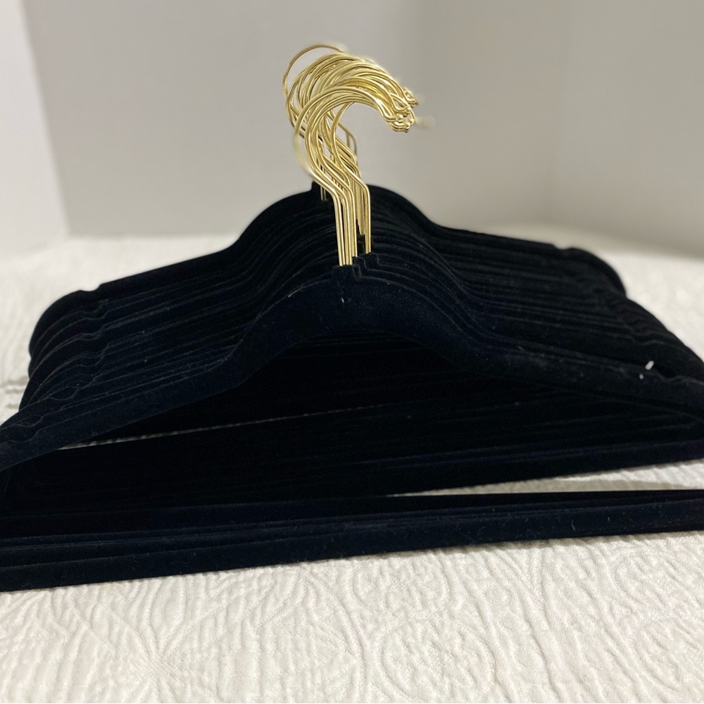 25 black felt with gold accent “that girl” hangers ;)
